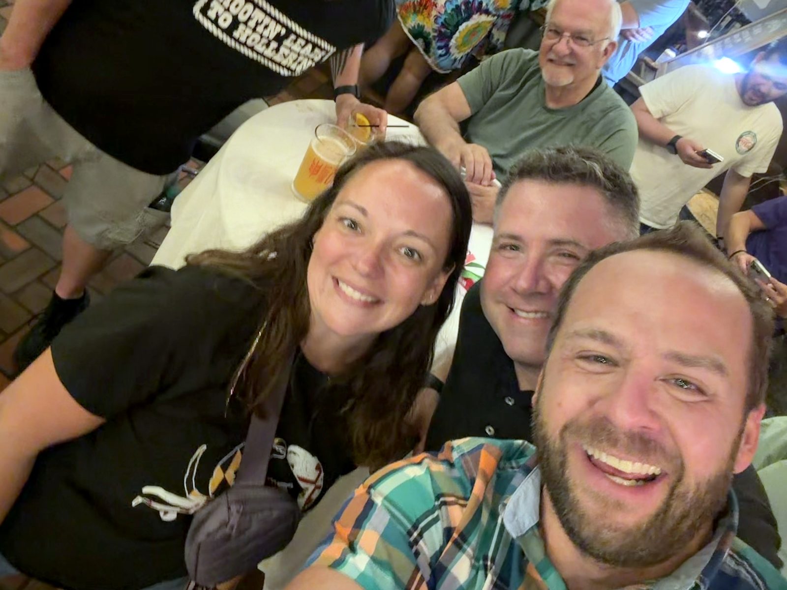 Guests smiling for a selfie at Mic Drop Columbus